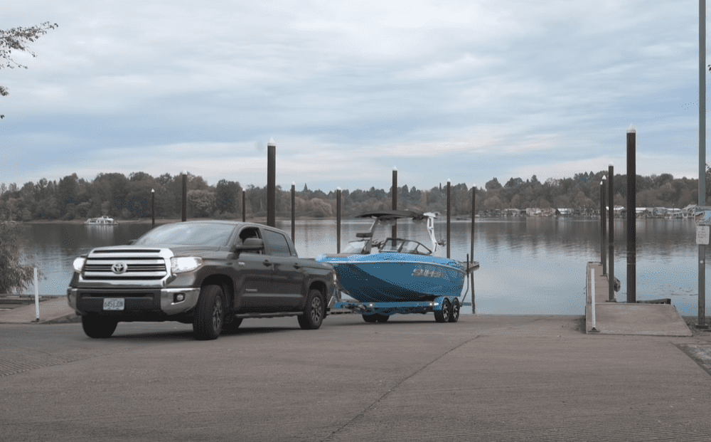 Unplug your trailer lights and move the car to the ramp